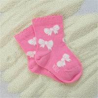 Pink socks with bows