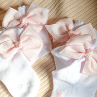 Formal socks with a light pink bow